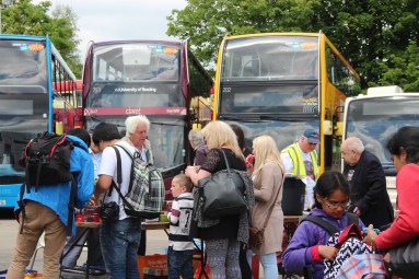 Visitors gather around one of the many sales stalls.